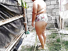 Sexy Colombian girl bathes in a public place and touches her pussy and tits very richly.