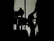 Silhouettes In The Balcony At Night