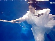Asian girl underwater