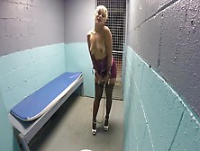 Blonde Flirting In Holding Cell