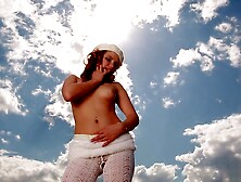 Redhead in White Jacket Playing with Herself