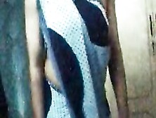 Womany In Sleeveless Saree