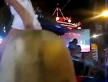 Girls riding mechanical bulls