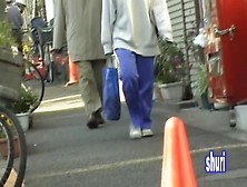 Sporty gal is wearing baggy clothes in the middle of sharking video