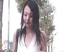 Breasty woman soaked with rain in bus