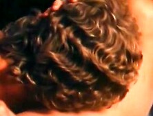 Annette Haven shows off her hot body and perfect tits at the gym while letting a friend put his dick in her pussy