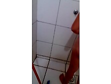 Filming the short sister taking a bath