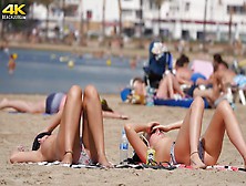 Hot Chick And Her Friend Go Topless On A Beach