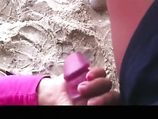 Girl Gives A Great Handjob At The Beach