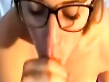 Petite Blonde Takes A Large Cumshot To Her Sexy Glasses