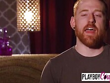 Swinger sexy ladies look each other eyes while sucking a big dick in the Red Orgy Room.