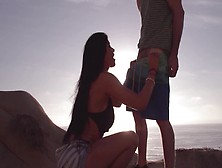 A hot lady is getting penetrated on the beach by her lover