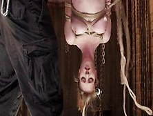 Slave In Pink Thong Gets Ass Caned