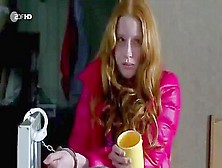 Redhead Held Handcuffed In Pink Downjacket