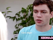 Stepmother and stepson doing yoga jointly.