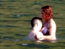 Amateur couple playing at beach - Madeira Island - Seixal