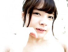 Graceful Asian Teen Enjoys A Quiet, Natural Moment