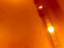 Trying on cloths and posing before mirror in bra