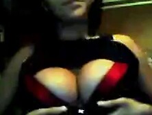 Cute brunette flashes huge boobs