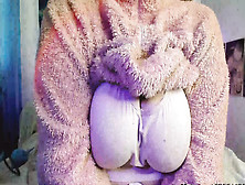 A Wide Woman In A Fluffy Suit Shows Her Body