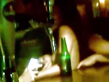 Dark haired russian girl dances naked in a bar