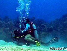 SCUBA Sex in a Miniskirt by a Pretty Coral Reef