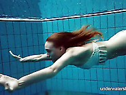 Knit swimsuit looks sexy on a swimming girl