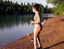 Thong bodysuit at the lake