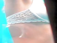 Real teens 18  changing their bikinis in the beach cabin