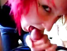Redhead chick emo is sucking a dick