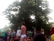 Guy gets naked at outdoor concert