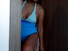 On the beach, my stepmom in a bikini shows me her hairy cunt, booty, and melons.