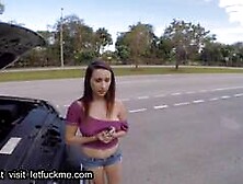 A young woman, blessed with a generous bust, engaged in sexual activity with an unkno