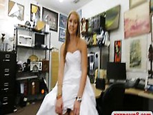 Woman in her wedding dress gets fucked by pawn keeper