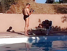 Babe Provides Satisfaction To Two Men By The Pool