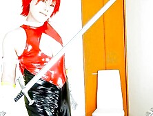 Oriental Cosplay Beauty Honey in Shiny PVC – Red & Ebony Cosplay Action - Crossdressing