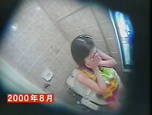 Girl setting nude ass on toilet bowl and masturbating on cam