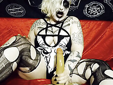 Ebony Metal Chick - She jerks off her dildo