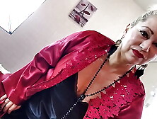 Cougar Lady Ex-wife in a red satin negligee, with a ponytail on her head and a penis in her mouth... ))
