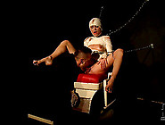 Gloved man fists her tight asshole