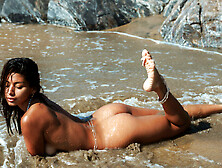 Petite Mexican babe strips at the beach