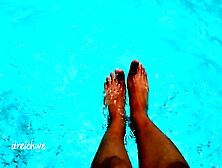 Feet In The Pool With A Lot Of Water