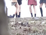 Four Japanese Schoolgirls Fool Around Outside Before Peeing