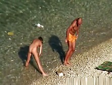 Nude Woman Swimming And Drinking