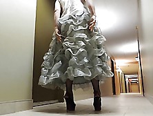 Sissy Ray In Silver Evening Dress In Hotel Corridor