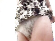 British hirsute mother i'd like to fuck lifts her petticoat and shows her constricted pants