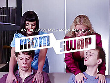 Curvy MILF moms Kiki Daire and Natasha Nice please their stepsons in a steamy group sex session