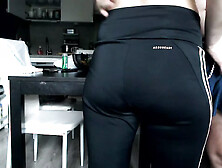 Fingering girl in black leggings and round ass