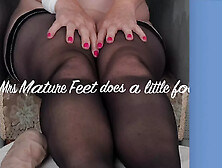 Mrs Mature Feet showing all her feet lovers her soles and toes in sheer Black Hold Ups. Part 1