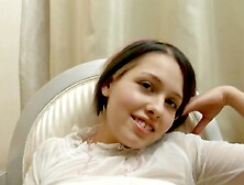 Cute girl Zanna spreads legs and masturbates on the chair